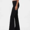 Pantaloni a zampa in maglia doppia a vita bassa