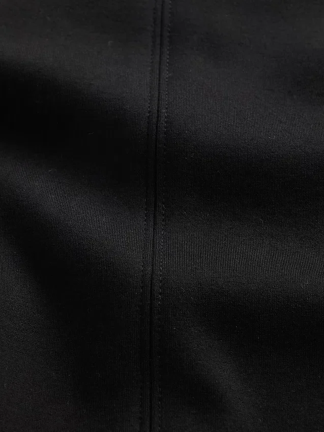 Pantaloni a zampa in maglia doppia a vita bassa