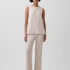 Pantaloni a zampa in misto lino a vita bassa