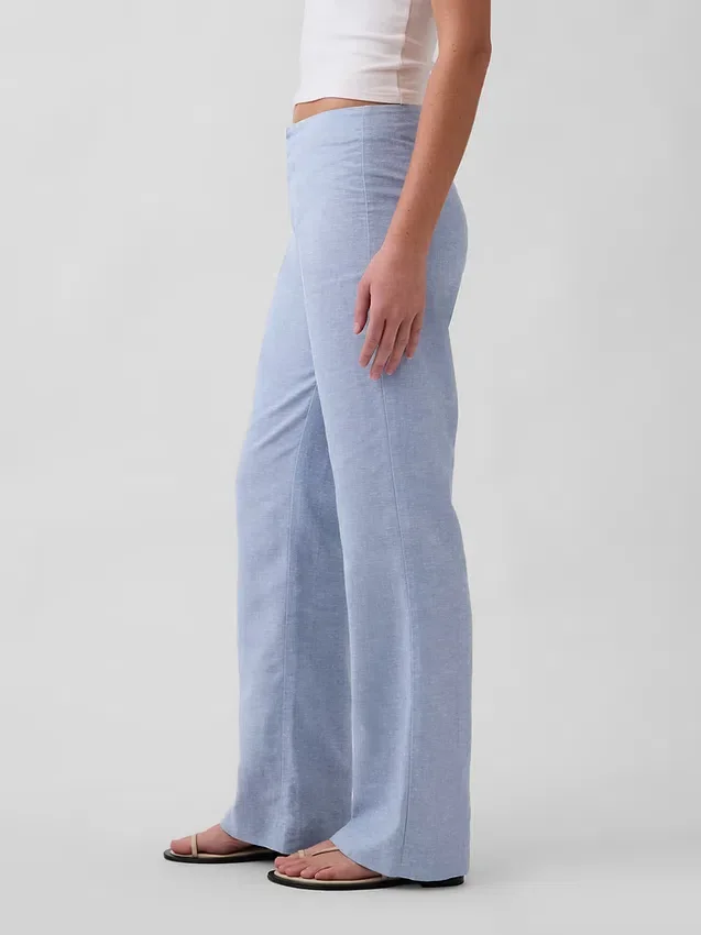 Pantaloni a zampa in misto lino a vita bassa