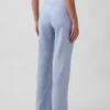 Pantaloni a zampa in misto lino a vita bassa