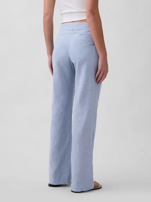 Pantaloni a zampa in misto lino a vita bassa