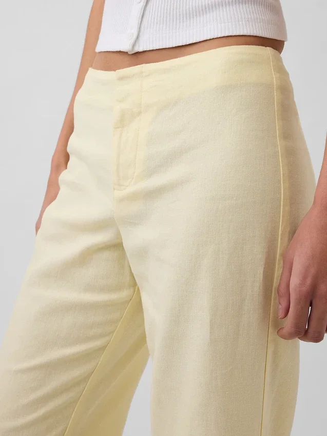 Pantaloni a zampa in misto lino a vita bassa