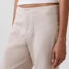 Pantaloni a zampa in misto lino a vita bassa