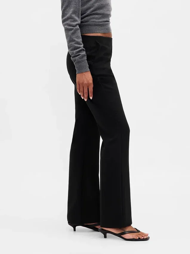 Pantaloni a zampa in twill a vita bassa