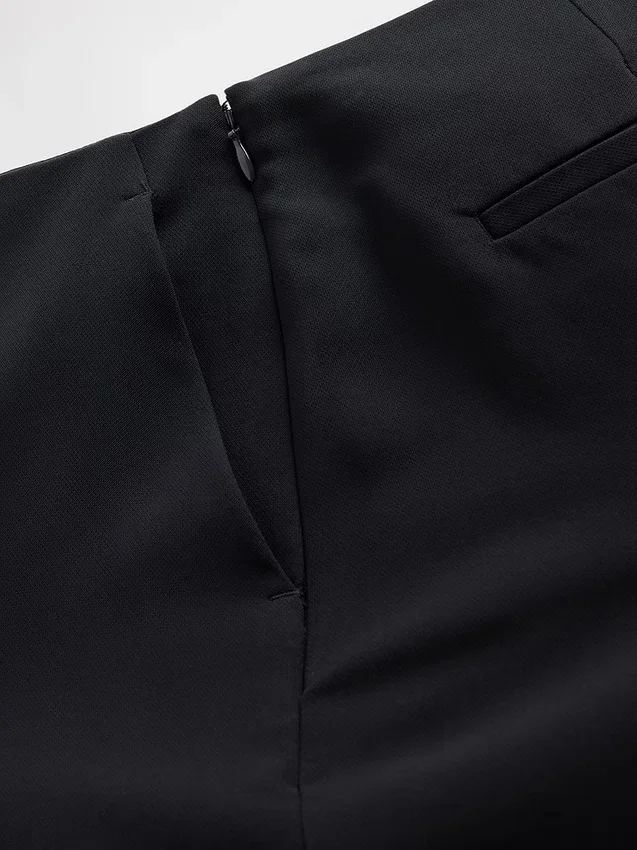 Pantaloni a zampa in twill a vita bassa