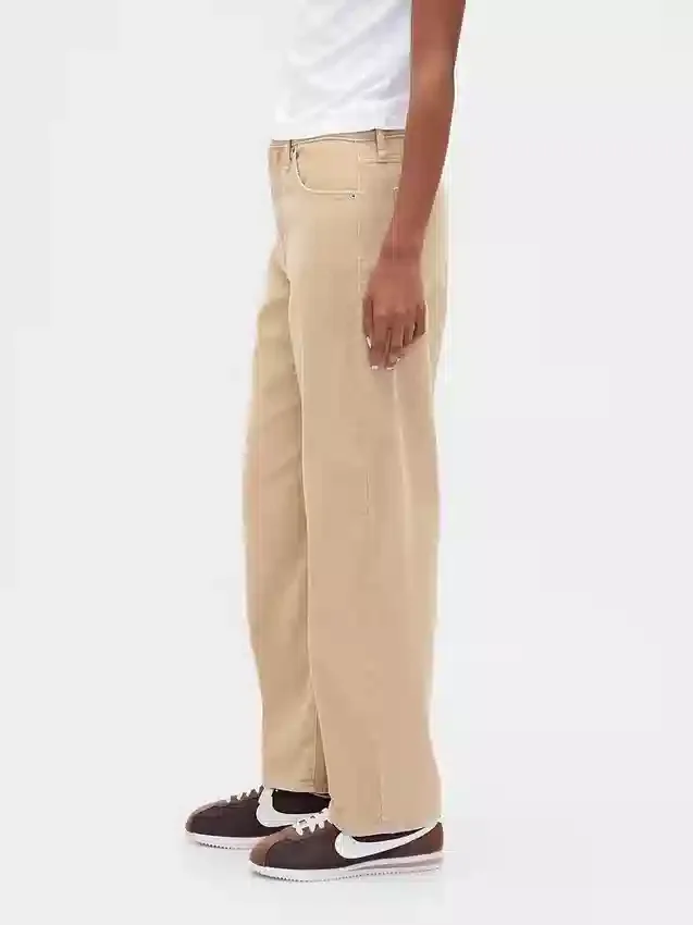 Pantaloni a zampa in velluto a coste a vita alta