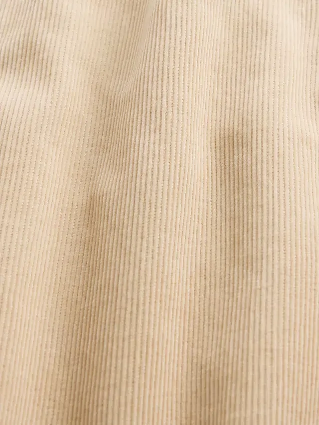 Pantaloni a zampa in velluto a coste a vita alta