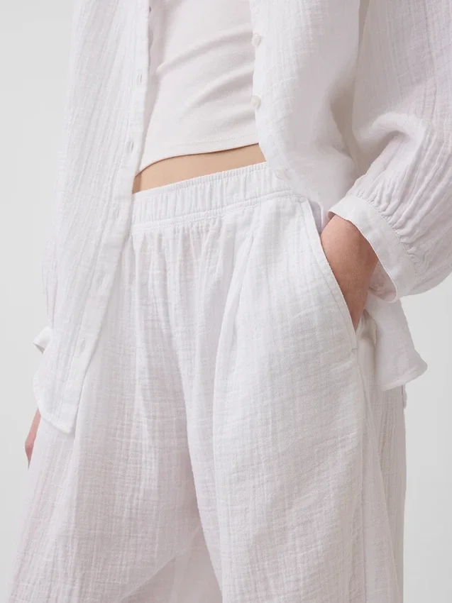 Pantaloni a zampa larghi in garza di cotone