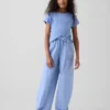 Pantaloni a zampa per bambini con doppio rinforzo sulle ginocchia