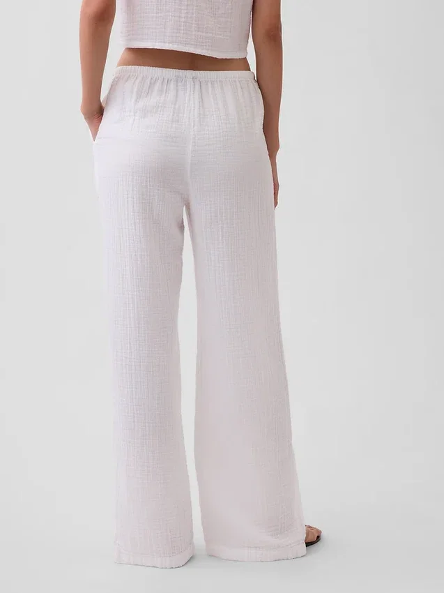 Pantaloni comodi in garza di cotone con orlo a spacco