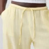 Pantaloni comodi in garza di cotone con orlo a spacco