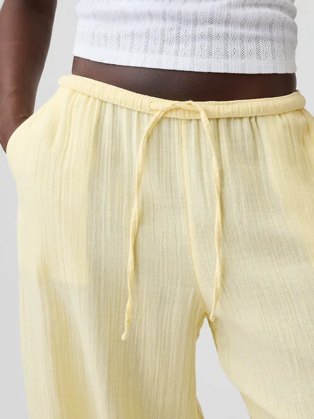 Pantaloni comodi in garza di cotone con orlo a spacco