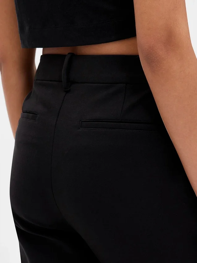 Pantaloni cropped slim a vita alta in maglia doppia