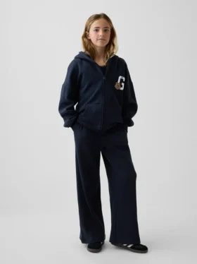 Pantaloni da bambino a gamba larga, comodi e dalla vestibilità rilassata, in maglia a nido d’ape