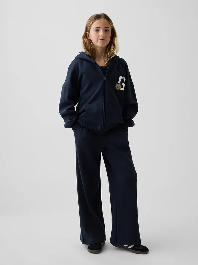 Pantaloni da bambino a gamba larga, comodi e dalla vestibilità rilassata, in maglia a nido d’ape