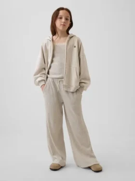 Pantaloni da bambino a gamba larga, comodi e dalla vestibilità rilassata, in maglia a nido d’ape