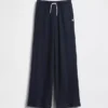 Pantaloni da bambino a gamba larga, comodi e dalla vestibilità rilassata, in maglia a nido d’ape