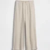 Pantaloni da bambino a gamba larga, comodi e dalla vestibilità rilassata, in maglia a nido d’ape