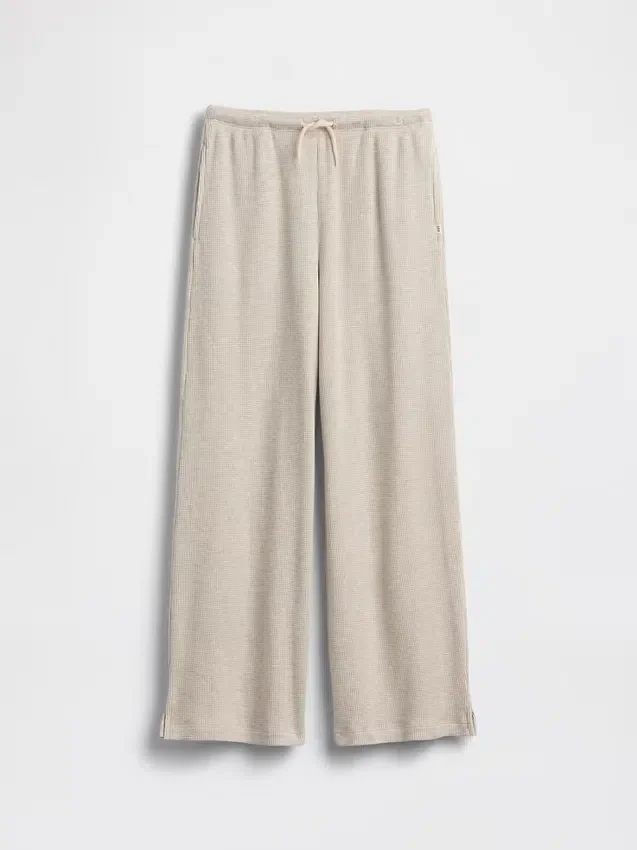 Pantaloni da bambino a gamba larga, comodi e dalla vestibilità rilassata, in maglia a nido d’ape