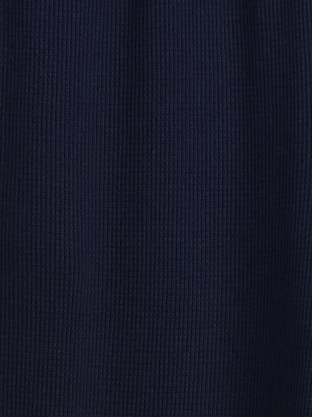 Pantaloni da bambino a gamba larga, comodi e dalla vestibilità rilassata, in maglia a nido d’ape