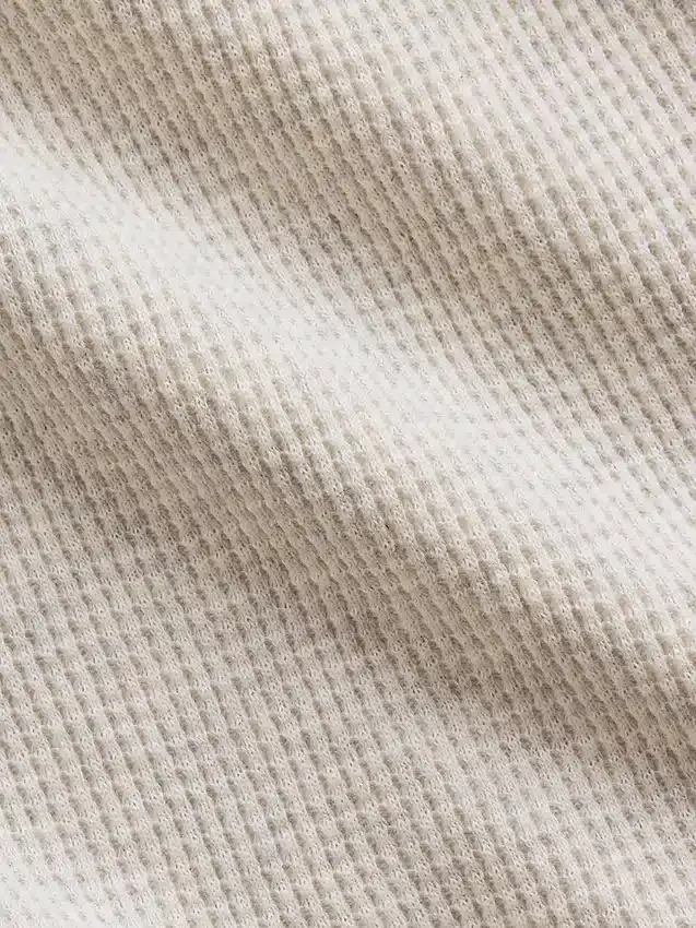 Pantaloni da bambino a gamba larga, comodi e dalla vestibilità rilassata, in maglia a nido d’ape