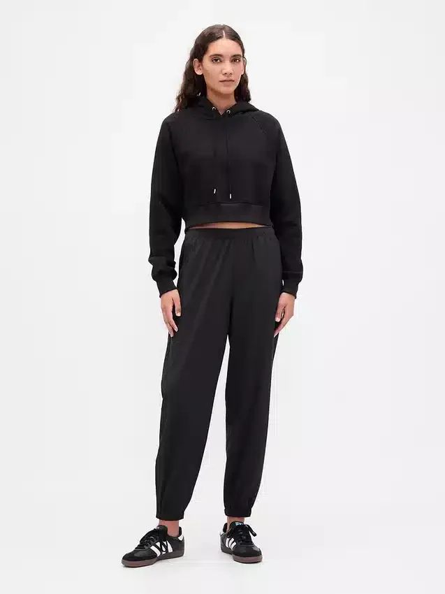 Pantaloni da jogging GapFit Tech a vita alta con orlo con cerniera