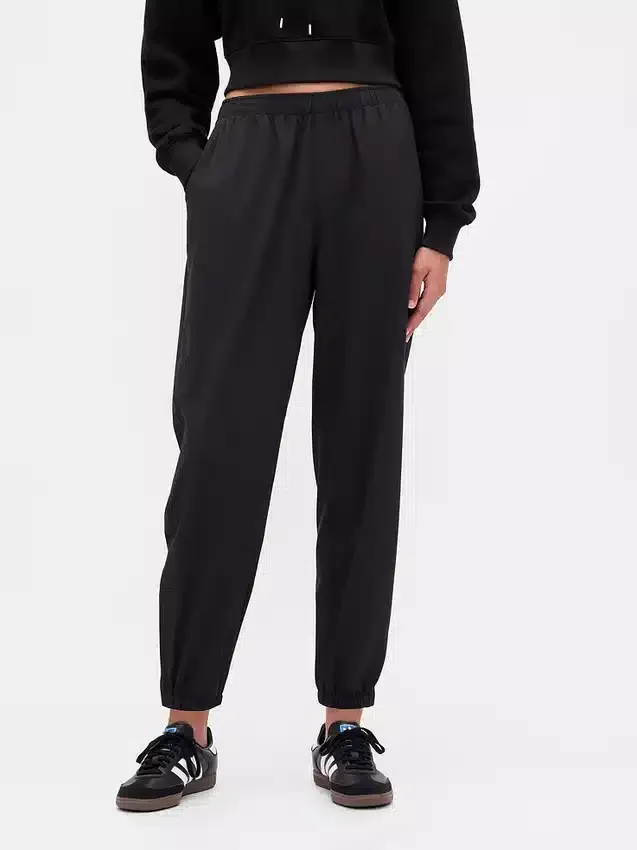 Pantaloni da jogging GapFit Tech a vita alta con orlo con cerniera