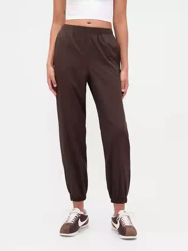 Pantaloni da jogging GapFit Tech a vita alta con orlo con cerniera