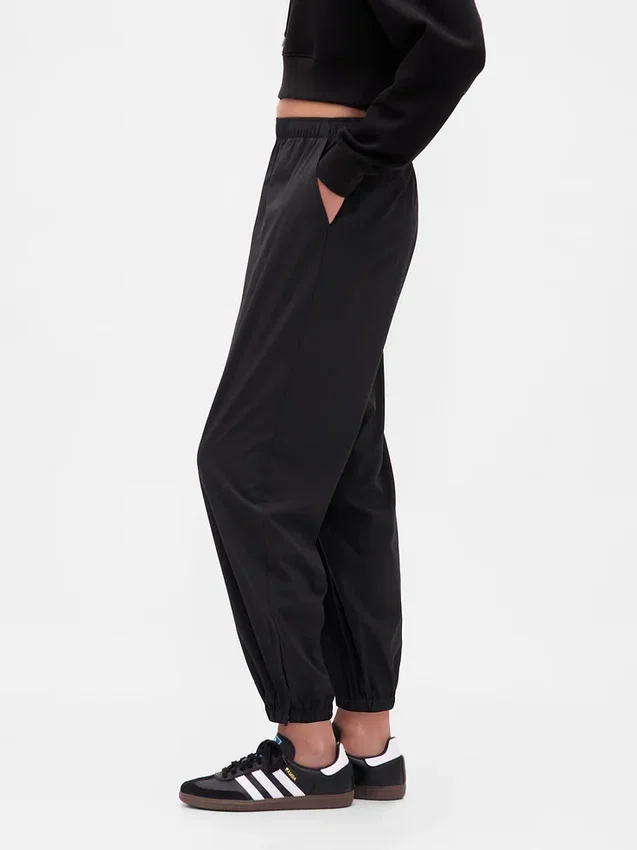 Pantaloni da jogging GapFit Tech a vita alta con orlo con cerniera