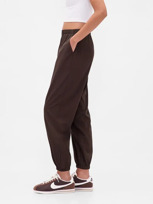 Pantaloni da jogging GapFit Tech a vita alta con orlo con cerniera