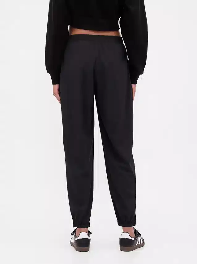 Pantaloni da jogging GapFit Tech a vita alta con orlo con cerniera