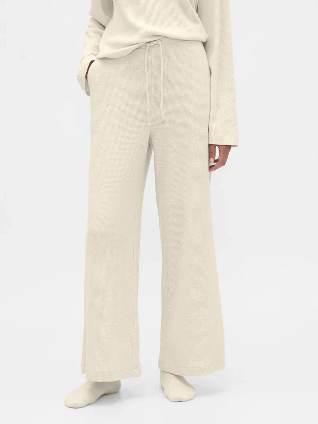 Pantaloni da pigiama a gamba larga in tessuto a nido d’ape
