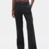 Pantaloni kaki a vita bassa dal taglio ampio e svasato