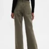 Pantaloni kaki a vita bassa dal taglio ampio e svasato