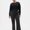 Pantaloni kaki a vita bassa dal taglio ampio e svasato
