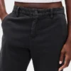 Pantaloni kaki a vita bassa dal taglio ampio e svasato