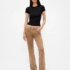 Pantaloni lunghi e slim in velluto a coste a vita bassa