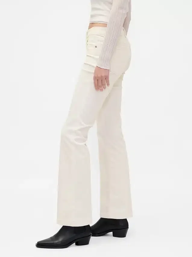 Pantaloni lunghi e slim in velluto a coste a vita bassa