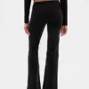 Pantaloni lunghi e slim in velluto a coste a vita bassa