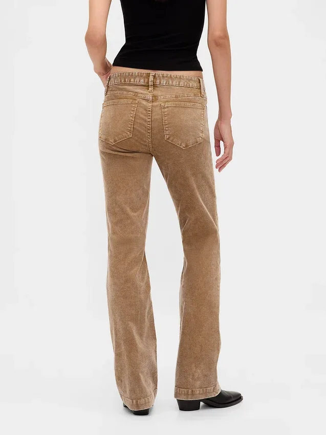 Pantaloni lunghi e slim in velluto a coste a vita bassa