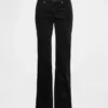 Pantaloni lunghi e slim in velluto a coste a vita bassa