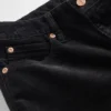 Pantaloni lunghi e slim in velluto a coste a vita bassa