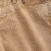 Pantaloni lunghi e slim in velluto a coste a vita bassa