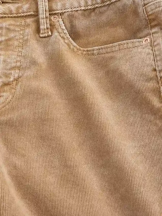 Pantaloni lunghi e slim in velluto a coste a vita bassa