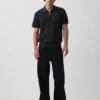 Polo in maglia testurizzata con zip