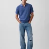 Polo in maglia testurizzata con zip