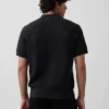 Polo in maglia testurizzata con zip