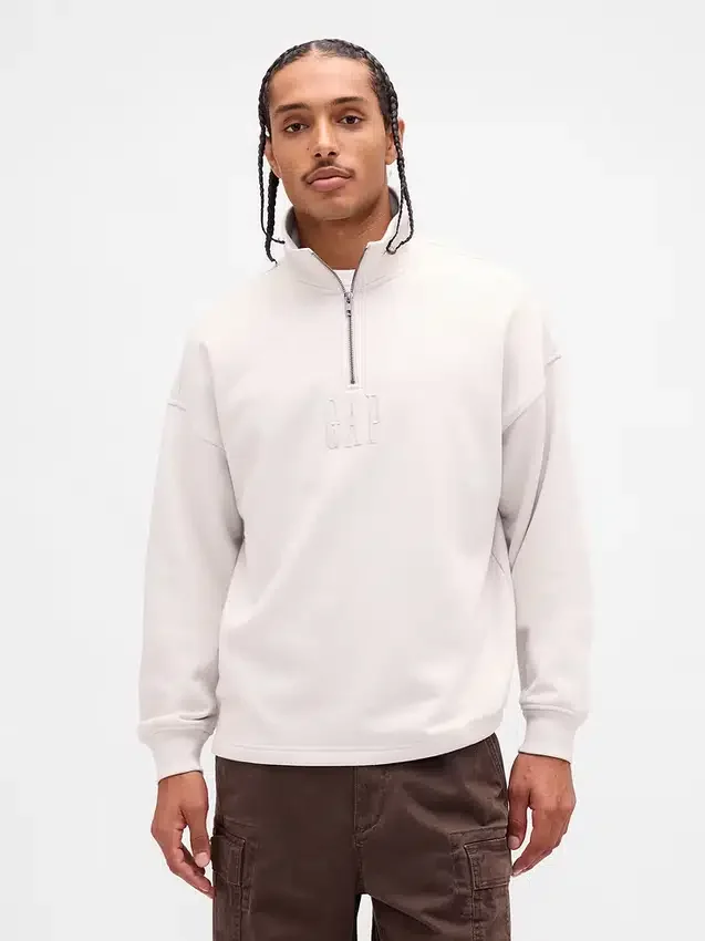 Pullover oversize pesante con logo e chiusura a un quarto di zip