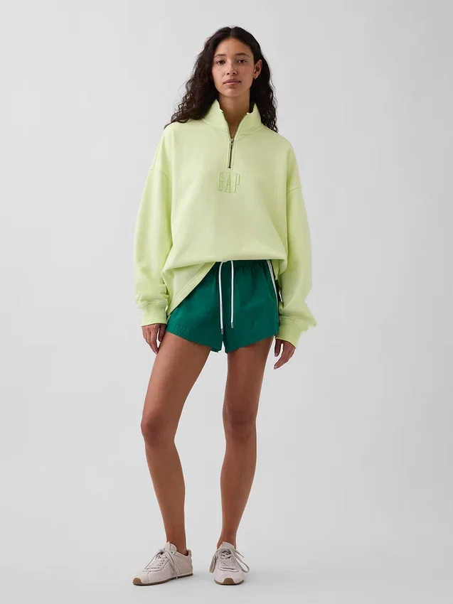 Pullover oversize pesante con logo e chiusura a un quarto di zip
